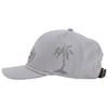 Gray baseball cap with a perforated palm tree design on the side and an adjustable strap at the back.