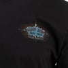 Close-up of a black shirt featuring a small Ron Jon Surf Shop Cocoa Beach-FL logo with a nautical design on the chest.