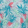 Colorful pattern with pineapples, palm leaves, and flowers on a blue background.