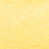 Yellow fabric with an embroidered pattern of flowers and stars.