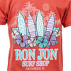 Red T-shirt featuring a Ron Jon Surf Shop design with surfboards, hibiscus flowers, and palm trees. Text reads Ron Jon Surf Shop, Cocoa Beach, FL.