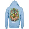A light blue hoodie featuring a colorful back graphic with palm trees, flowers, a pineapple, surfboards, and text reading Cocoa Beach Surf Shop, Cocoa Beach, Fla.