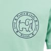 A green shirt featuring a circular Puppie Love logo with a cartoon dog and the words Save, Rescue, and Love surrounded by small paw prints.