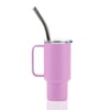 Pink insulated travel mug with a handle and lid, featuring a reusable metal straw.
