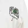 Close-up of a white shirt featuring the text Orlando Florida Ron Jon Surf Shop with a graphic of a green palm tree.