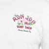 White t-shirt with Ron Jon Surf Shop, Cocoa Beach, Fla. text and a graphic of pink flowers printed on the chest.