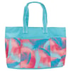 A turquoise and coral tote bag with a tropical leaf pattern, featuring long handles and a structured design.