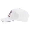 A white baseball cap with a curved brim and an embroidered patch on the front, shown from a side angle.