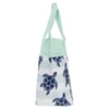 Light green tote bag with dark blue turtle prints on white stripes.