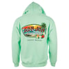 The image shows the back of a light green hoodie featuring Ron Jon Surf Shop and Cocoa Beach with a colorful surfboard and tropical motif.