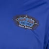 A close-up of a blue shirt featuring the Ron Jon Surf Shop Cocoa Beach, FL logo printed on the chest.