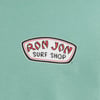 Green fabric displaying a Ron Jon Surf Shop logo with red and white lettering.