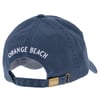 Navy blue baseball cap with Orange Beach embroidered on the back. Buckle strap closure and small brass accent tag on the strap.