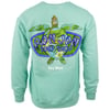 A seafoam green sweatshirt featuring a colorful sea turtle design and the text Ron Jon Surf Shop Key West on the back.