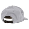 Back view of a gray baseball cap with ventilation holes and an adjustable strap with a black buckle.