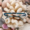51640979000-4ocean-teal-ghost-net-bracelet-life-style.jpg