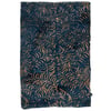 A sarong with a dark blue background and a swirling tan fern or leaf pattern covering the entire surface.