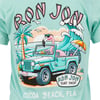 Illustration of a flamingo driving a teal car with a surfboard and umbrella on the beach, with Ron Jon Surf Shop and Cocoa Beach, Fla text on a teal t-shirt.
