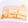 A close-up of a hat with the logo Ron Jon Surf Shop in white text on an orange and pink background, featuring palm trees and a sun graphic.