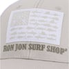 Beige cap with an embroidered Ron Jon Surf Shop logo and a patch resembling a flag, featuring fish silhouettes.