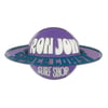 A magnet shaped like a planet with rings, featuring the text Ron Jon Space Coast Surf Shop in white and blue on a purple background.