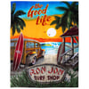 A beach scene with sunset, palm trees, a wooden station wagon with surfboards, and a sign reading Ron Jon Surf Shop. Text says the Good Life.