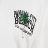 Close-up of a white shirt with Panama City Beach Ron Jon Surf Shop text and a palm tree graphic on the chest.