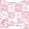 A pink and white patterned fabric with floral designs and a cut-out circle in the middle.