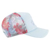 A light blue baseball cap with a floral-patterned mesh panel on the side, showcasing red and white flowers.