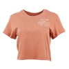 A short-sleeved, peach-colored crop top with Rhythm and sea-themed illustrations printed on the upper left side.