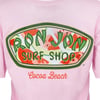 A Ron Jon Surf Shop logo with a watermelon pattern and Cocoa Beach written below in red script on a pink background.