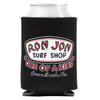 A silver can in a black coozie that reads Ron Jon Surf Shop One of a Kind Cocoa Beach, Fla.