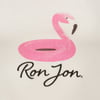 A pink flamingo illustration above the text Ron Jon in stylized black script on an off-white background.