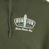Close-up of a green hoodie with a Ron Jon Surf Shop Cocoa Beach, Fla. logo and a light blue surfboard graphic on the chest.