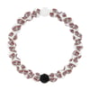 White beaded bracelet with Ron Jon Surf Shop logos on each bead and one black bead.