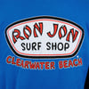 Blue T-shirt featuring a Ron Jon Surf Shop logo with Clearwater Beach text below in red and white.