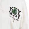 A white sweatshirt with the text KEY WEST RON JON SURF SHOP and a graphic of a palm tree printed on the chest.