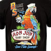 Back of a shirt featuring a colorful parrot in a sailor hat holding a skull drink next to a Ron Jon Surf Shop sign with palm trees and the text ‚ÄúDark Seas Presents the Low Tide Lounge.‚Äù.