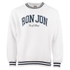 White sweatshirt with RON JON Surf Shop in large navy letters on the front. The collar, cuffs, and hem feature navy stripes.