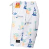 White swim shorts with colorful tropical designs, including pineapples, palm trees, and suns. Texts like Malibu and Hawaii are printed.