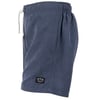 Navy blue shorts with elastic waistband, drawstring, and side pocket on the right. Black and white logo patch near the hem.