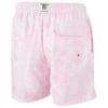 Light pink swim shorts with a subtle tropical print, featuring an elastic waistband, side pockets, and a buttoned back pocket.