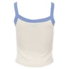 A sleeveless, cream-colored tank top with wide, light blue trim along the neckline and shoulder straps, displayed on a plain white background.