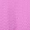 Close-up of a pink fabric with a repetitive wavy texture pattern.
