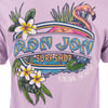 Purple T-shirt featuring Ron Jon Surf Shop design with tropical flowers and a flamingo, labeled Cocoa Beach.