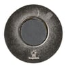 The back of a circular black and silver button magnet.