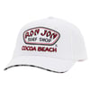White baseball cap with Ron Jon Surf Shop Cocoa Beach embroidered on the front and One of a Kind text on the edge of the brim.