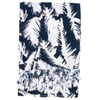 A navy blue and white patterned fabric with abstract leaf designs and knotted fringe tassels along one edge.