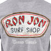 Gray T-shirt featuring a weathered Ron Jon Surf Shop logo with Cocoa Beach text beneath.