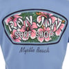 Blue shirt with Ron Jon Surf Shop logo featuring pink hibiscus flowers and Myrtle Beach text.